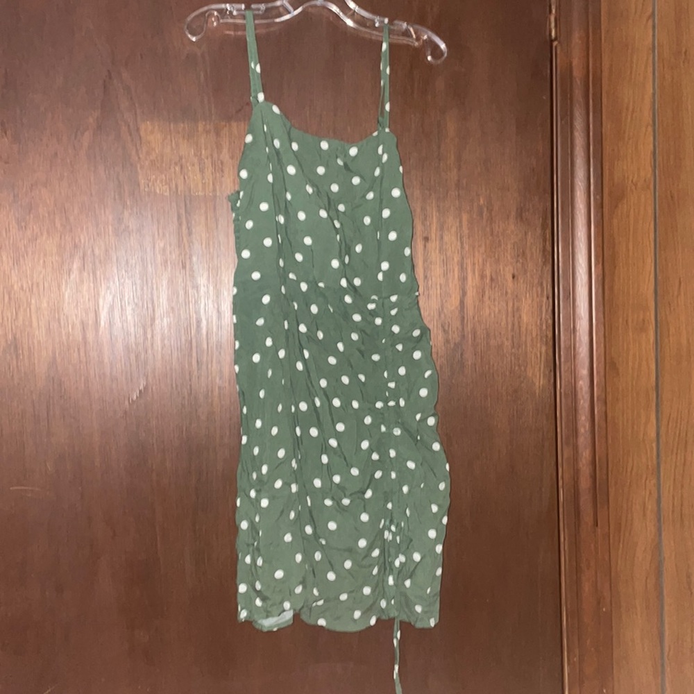 Green with white polkadots very lightly worn just needs an ironing.